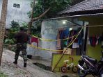 polisi-menggeledahan-rumah-diduga-teroris-di-lampung_20180518_201359.jpg