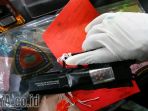polisi-menunjukan-barang-bukti-senjata-api-air-gun-yang-disita-da_20171222_195027.jpg
