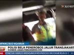 polisi-tilang-supir-trans-jakarta_20150326_185821.jpg