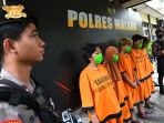polres-malang-rilis-tersangka-tppo_20230615_182520.jpg