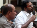 polri-bertemu-haris-azhar-terkait-pencemaran-nama-baik_20160810_193214.jpg