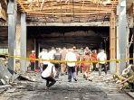 polri-dan-polda-metro-olah-tkp-gedung-kejagung.jpg