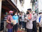 polri-memberikan-bantuan-kepada-nelayan-di-kali-baru-cilincing-jakarta-utara.jpg