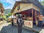 pos-polisi-99-ndeotadi-papua.jpg