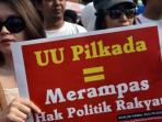 poster-penolakan-disahkannya-uu-pilkada-oleh-dpr_20150319_103202.jpg