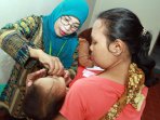 posyandu-wijayakusuma-adakan-imunisasi-balita_20150210_101535.jpg