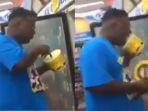 potongan-rekaman-video-memperlihatkan-seorang-pria-ketika-menjilati-es-krim-di-supermarket.jpg