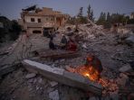 potret-buka-puasa-pertama-warga-gaza-di-tengah-perang_20240313_062152.jpg
