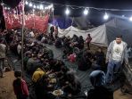 potret-buka-puasa-pertama-warga-gaza-di-tengah-perang_20240313_063502.jpg