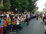 potret-keseruan-pawai-obor-yang-berlangsung-di-jakarta-timur-sore-tadi-rabu-1582018_20180815_200317.jpg
