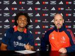 potret-pemain-anyar-manchester-united-joshua-zirkzee-bersama-erik-ten-hag.jpg