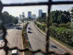 ppkm-darurat-hari-ke-9-jalan-tol-sepi_20210712_182547.jpg