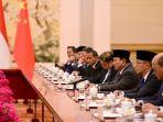 prabowo-li-qiang-tukeran-pelajarrr.jpg