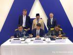 prabowo-subianto-dan-pejabat-terkait-menyaksikan-penandatangan-kontrak.jpg