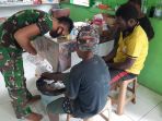 prajurit-yonif-413-bremoro-obati-luka-infeksi-frambusia_20200826_003204.jpg