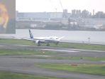 presiden-ioc-thomas-bach-tiba-di-bandara-haneda.jpg