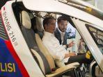 presiden-joko-widodo-merasakan-kabin-mobil-listrik-ehang.jpg