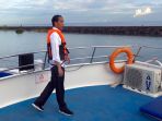 presiden-jokowi-dan-istri-kunjungi-perairan-kepulauan-bunaken_20190705_145108.jpg
