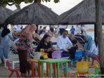 presiden-jokowi-dan-keluarga-menikmati-pantai-nusa-dua-bali-bar.jpg