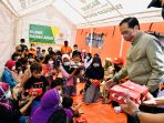 presiden-jokowi-datangi-posko-pengungsi-gunung-semeru_20211207_191558.jpg