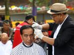 presiden-jokowi-ikut-potong-rambut-massal_20190120_004329.jpg