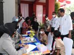 presiden-jokowi-kunjungi-vaksinasi-anak-usia-6-11-tahun_20211215_173035.jpg