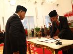 presiden-jokowi-lantik-pimpinan-kpk_20191220_200033.jpg