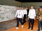 presiden-jokowi-menko-muhadjir-effendy-dan-mentan-amran-sulaiman-di-gudang-bulog-klahang-banyumas.jpg