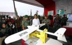 presiden-jokowi-tinjau-pameran-alutsista-tni-ad_20141217_212352.jpg
