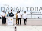 presiden-jokowi-tinjau-penataan-kawasan-pantai-bebas-parapat_20220203_065843.jpg