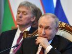 presiden-rusia-vladimir-putin-dan-juru-bicara-rusia-dmitry-peskov-225.jpg