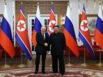 presiden-rusia-vladimir-putin-dan-pemimpin-korea-utara-kim-jong-un-berfoto-bersama.jpg
