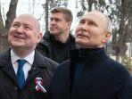 presiden-rusia-vladimir-putin-gubernur-sevastopol-mikhail-razvozhayev.jpg