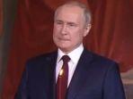 presiden-rusia-vladimir-putin-terlihat-menggigit-bibir-bawahnya.jpg