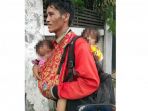 pria-asal-bone-gendong-dua-anak_20171126_115232.jpg