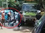 pria-berkutang-hitam-aniaya-sopir-truk.jpg