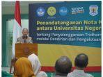 prof-dr-komarudin.jpg