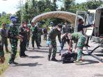 proses-evakuasi-jenazah-seorang-prajurit-tni-atas-nama-pratu-f.jpg