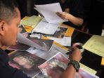 proses-identifikasi-korban-lion-air-pk-lqp-oleh-tim-dvi-1_20181102_164003.jpg