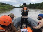 proses-pencarian-irt-diterkam-buaya.jpg