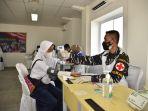 proses-vaksinasi-para-pelajar-dilakukan-di-atas-kapal-kri-bintuni.jpg