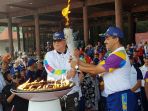 prosesi-penyalaan-kembali-obor-asian-games-2018_20180815_121305.jpg