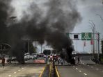 protes-kenaikan-harga-bbm-demonstran-blokade-jalan-di-panama_20220722_084242.jpg