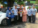 pt-pos-indonesia-dan-pt-bank-tabungan-negara-serahkan-hadiah-sebuah-mobil_20171004_210317.jpg