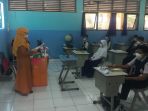 ptm-pelajar-smp-kota-tangerang-ketat-prokes-covid-19_20210913_113000.jpg