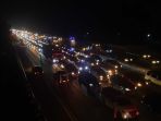 puncak-arus-balik-tol-japek-arah-jakarta-padat_20240416_085259.jpg