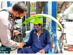 purnomo-bagikan-rata-total-rp-10-juta-untuk-para-pekerja-di-pinggir-jalan.jpg