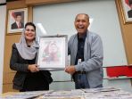 puti-mendatangi-kantor-tribun_20180215_215140.jpg