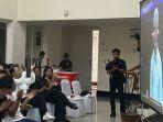 putra-bungsu-mahfud-nobar-debat.jpg