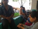 putri-13-bersama-ayahnya-dul-48-warga-pasar-5-kecamatan-medan-tembung_20180605_070137.jpg